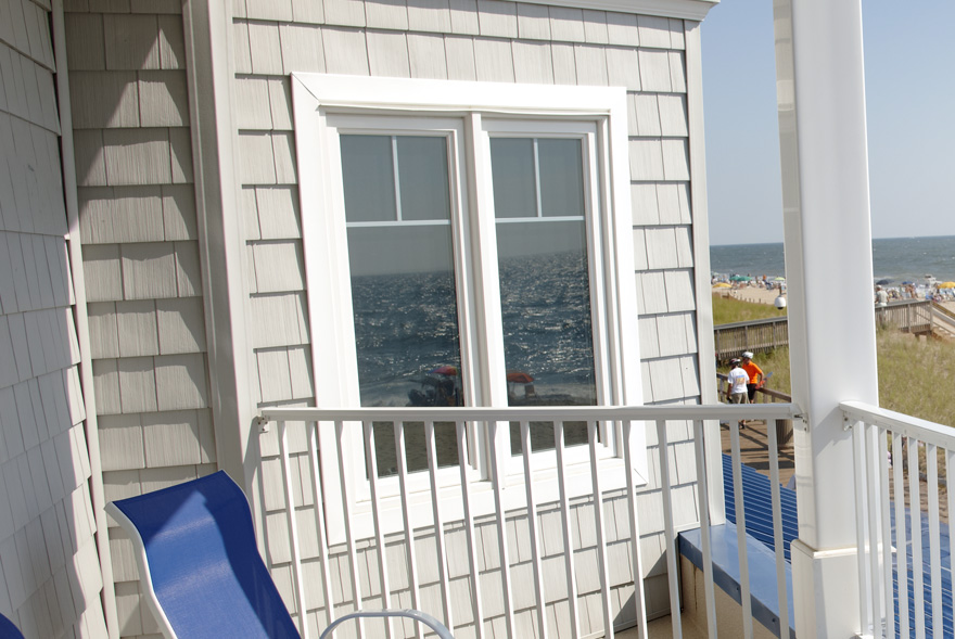 Impact-resistant casement windows on the coast.